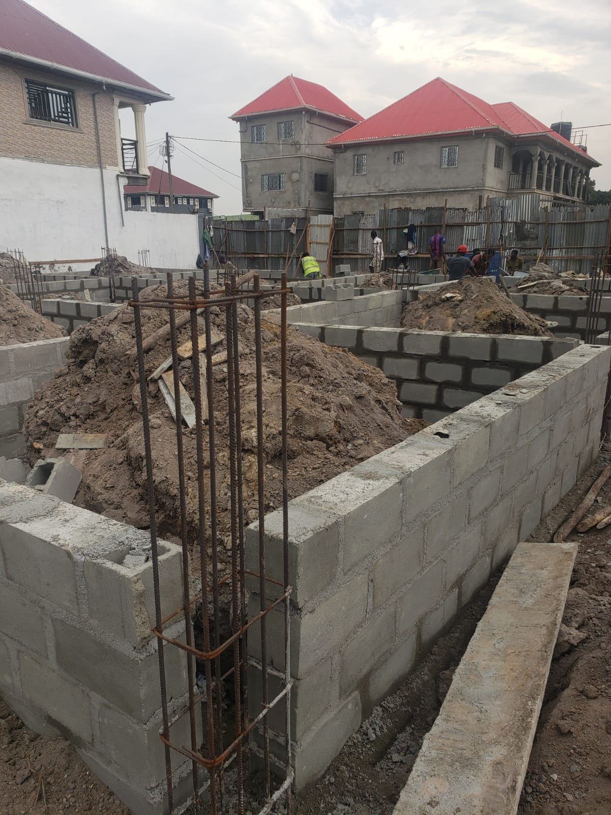 Twin Building Foundations — Zoe Louis, Gardnersville — view 1