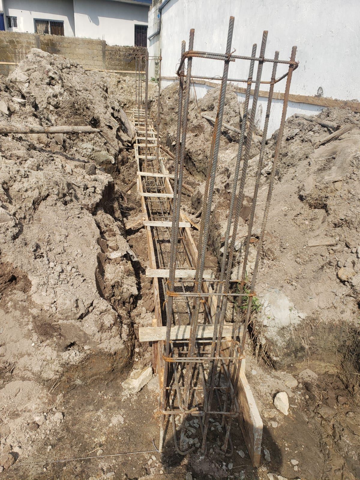 Twin Building Foundations — Zoe Louis, Gardnersville — view 10