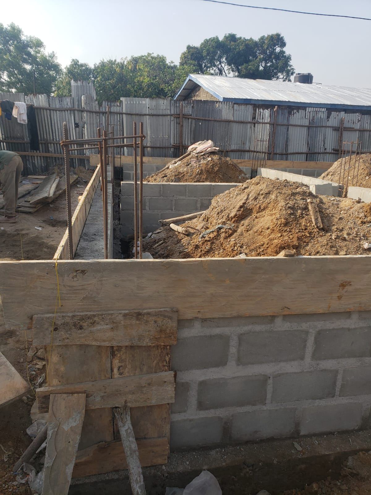Twin Building Foundations — Zoe Louis, Gardnersville — view 4