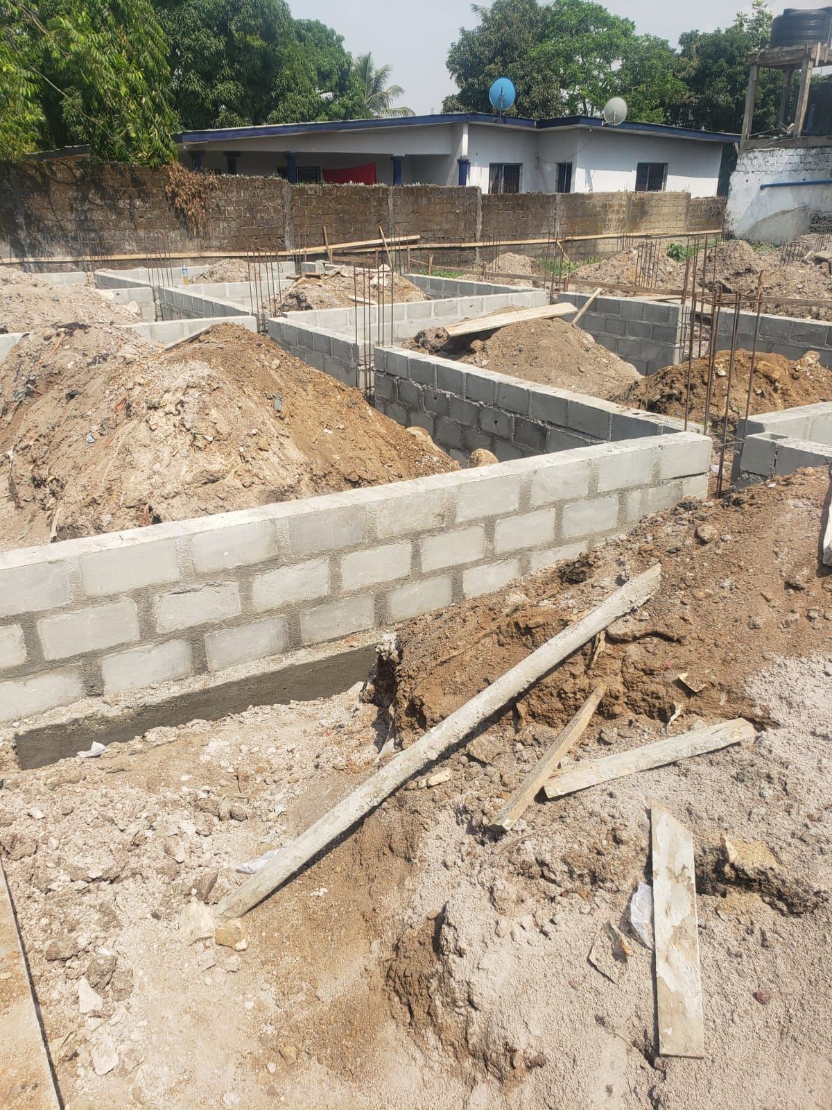 Twin Building Foundations — Zoe Louis, Gardnersville — view 9